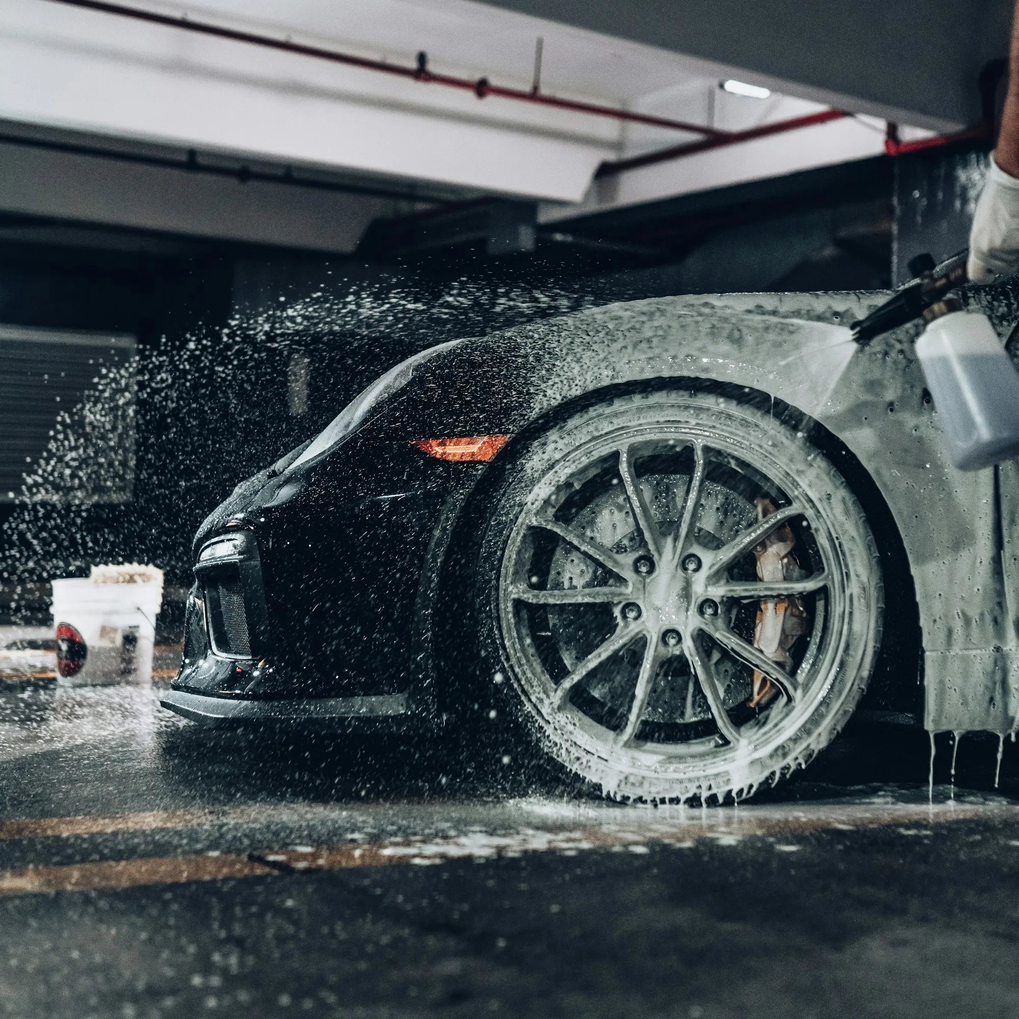 Foam pre wash on a black car